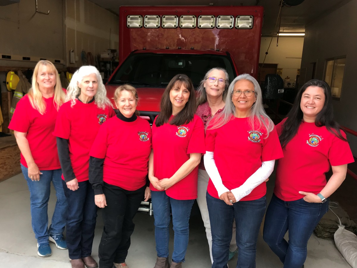 Auxiliary members with the ambulance