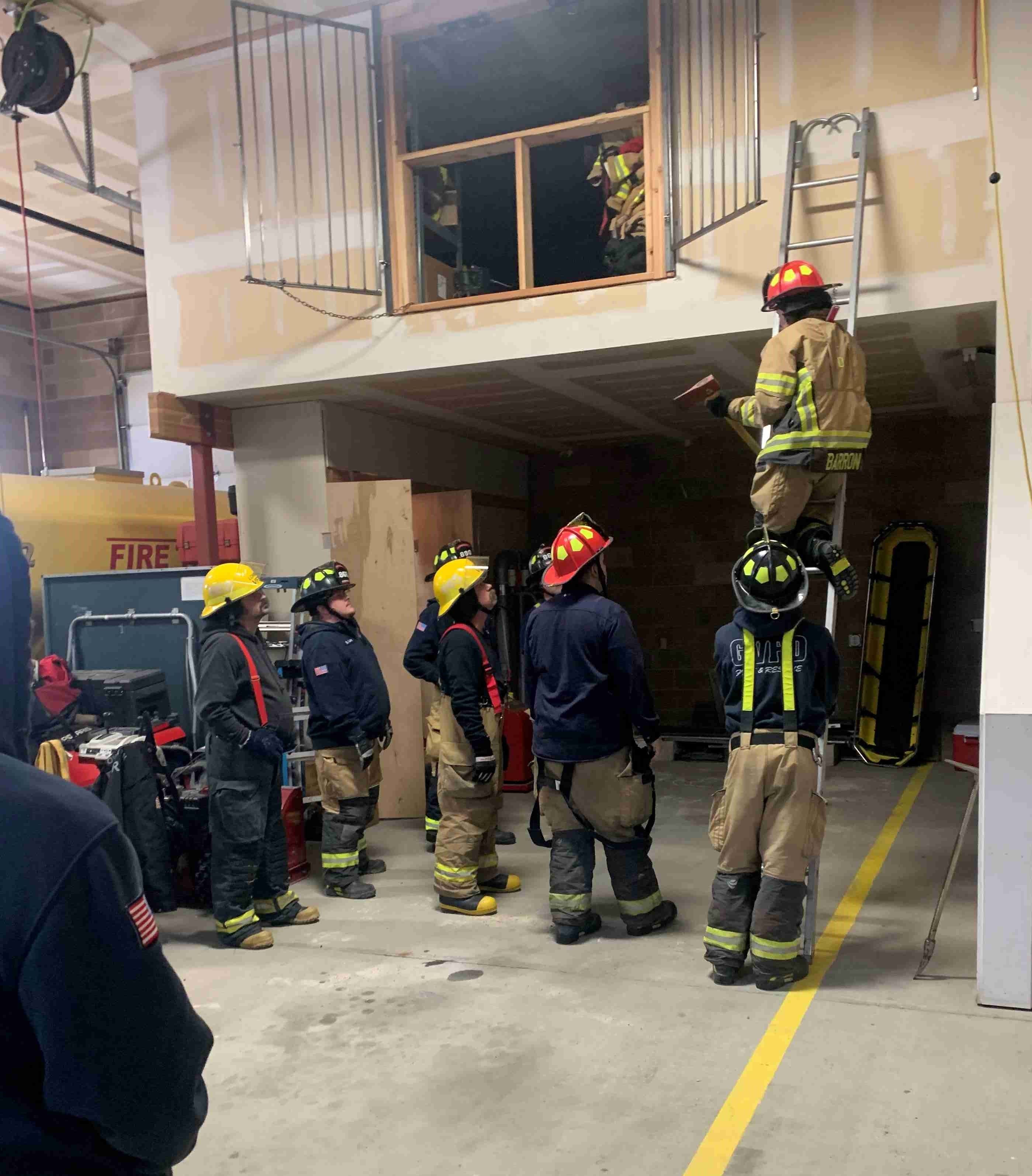 Training members in front of station 1